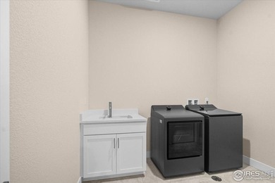 YOUR OWN PRIVATE FENCED BACKYARD + MAINTENANCE FREE? This is it! on Pelican Lakes Golf and Country Club in Colorado - for sale on GolfHomes.com, golf home, golf lot