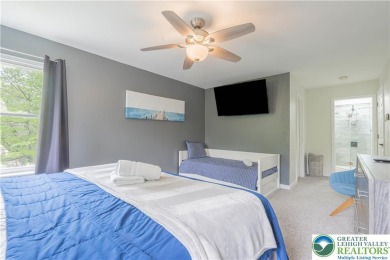 This beautifully renovated 3-bedroom, 3-bathroom home is the on Pocono Farms Country Club in Pennsylvania - for sale on GolfHomes.com, golf home, golf lot