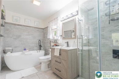 This beautifully renovated 3-bedroom, 3-bathroom home is the on Pocono Farms Country Club in Pennsylvania - for sale on GolfHomes.com, golf home, golf lot