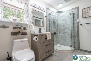 This beautifully renovated 3-bedroom, 3-bathroom home is the on Pocono Farms Country Club in Pennsylvania - for sale on GolfHomes.com, golf home, golf lot