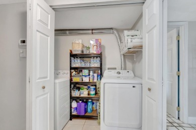 Welcome to this charming first-floor condo located in the on Fountains Golf and Country Club in Florida - for sale on GolfHomes.com, golf home, golf lot
