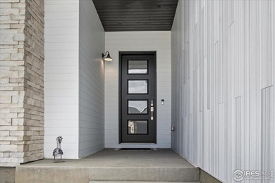 YOUR OWN PRIVATE FENCED BACKYARD + MAINTENANCE FREE? This is it! on Pelican Lakes Golf and Country Club in Colorado - for sale on GolfHomes.com, golf home, golf lot