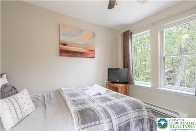 This beautifully renovated 3-bedroom, 3-bathroom home is the on Pocono Farms Country Club in Pennsylvania - for sale on GolfHomes.com, golf home, golf lot