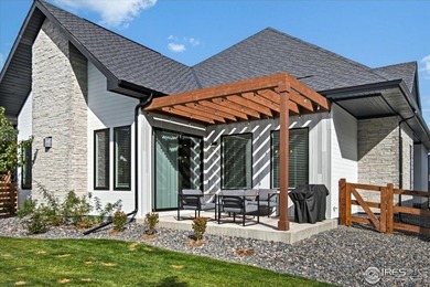 YOUR OWN PRIVATE FENCED BACKYARD + MAINTENANCE FREE? This is it! on Pelican Lakes Golf and Country Club in Colorado - for sale on GolfHomes.com, golf home, golf lot