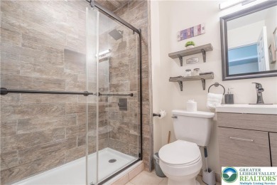 This beautifully renovated 3-bedroom, 3-bathroom home is the on Pocono Farms Country Club in Pennsylvania - for sale on GolfHomes.com, golf home, golf lot