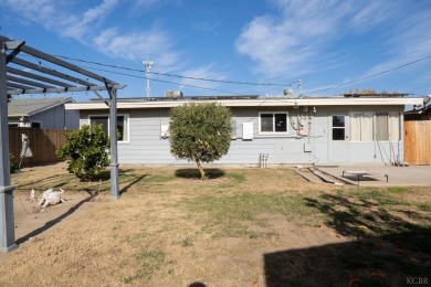 Great opportunity to purchase a move-in ready home with a big on Lemoore Municipal Golf Course in California - for sale on GolfHomes.com, golf home, golf lot
