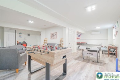 This beautifully renovated 3-bedroom, 3-bathroom home is the on Pocono Farms Country Club in Pennsylvania - for sale on GolfHomes.com, golf home, golf lot