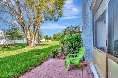 Welcome to this charming first-floor condo located in the on Fountains Golf and Country Club in Florida - for sale on GolfHomes.com, golf home, golf lot