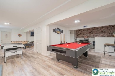 This beautifully renovated 3-bedroom, 3-bathroom home is the on Pocono Farms Country Club in Pennsylvania - for sale on GolfHomes.com, golf home, golf lot