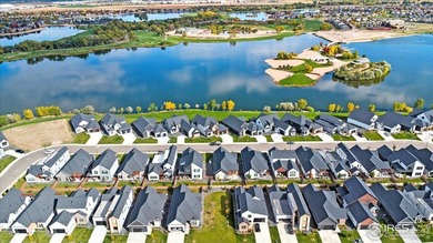 YOUR OWN PRIVATE FENCED BACKYARD + MAINTENANCE FREE? This is it! on Pelican Lakes Golf and Country Club in Colorado - for sale on GolfHomes.com, golf home, golf lot