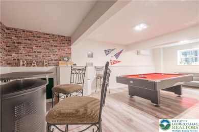 This beautifully renovated 3-bedroom, 3-bathroom home is the on Pocono Farms Country Club in Pennsylvania - for sale on GolfHomes.com, golf home, golf lot