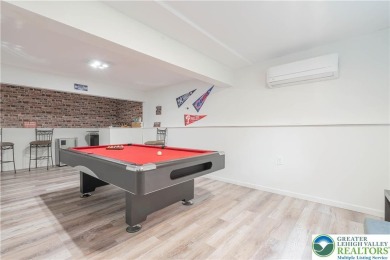 This beautifully renovated 3-bedroom, 3-bathroom home is the on Pocono Farms Country Club in Pennsylvania - for sale on GolfHomes.com, golf home, golf lot