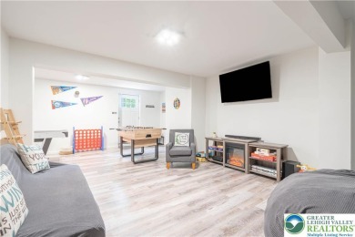 This beautifully renovated 3-bedroom, 3-bathroom home is the on Pocono Farms Country Club in Pennsylvania - for sale on GolfHomes.com, golf home, golf lot