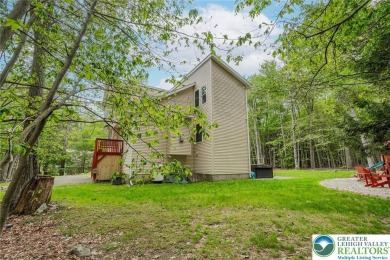 This beautifully renovated 3-bedroom, 3-bathroom home is the on Pocono Farms Country Club in Pennsylvania - for sale on GolfHomes.com, golf home, golf lot