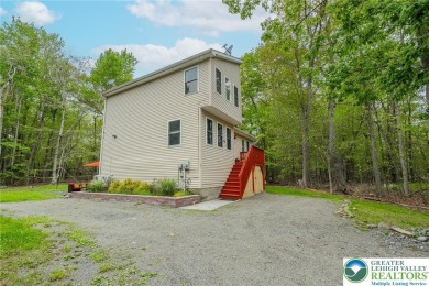 This beautifully renovated 3-bedroom, 3-bathroom home is the on Pocono Farms Country Club in Pennsylvania - for sale on GolfHomes.com, golf home, golf lot