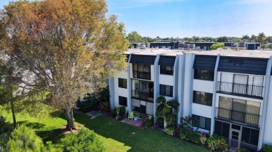 Welcome to this charming first-floor condo located in the on Fountains Golf and Country Club in Florida - for sale on GolfHomes.com, golf home, golf lot