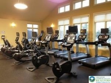 This beautifully renovated 3-bedroom, 3-bathroom home is the on Pocono Farms Country Club in Pennsylvania - for sale on GolfHomes.com, golf home, golf lot