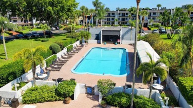 Welcome to this charming first-floor condo located in the on Fountains Golf and Country Club in Florida - for sale on GolfHomes.com, golf home, golf lot