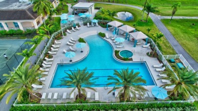 Welcome to this charming first-floor condo located in the on Fountains Golf and Country Club in Florida - for sale on GolfHomes.com, golf home, golf lot