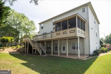 Nestled in the heart of a sought-after neighborhood, Woodmont on Woodmont Golf and Country Club in Georgia - for sale on GolfHomes.com, golf home, golf lot