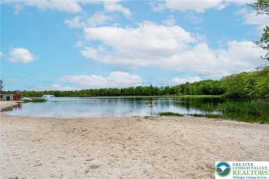 This beautifully renovated 3-bedroom, 3-bathroom home is the on Pocono Farms Country Club in Pennsylvania - for sale on GolfHomes.com, golf home, golf lot