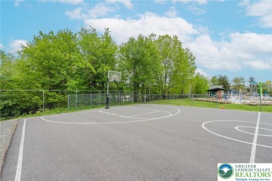 This beautifully renovated 3-bedroom, 3-bathroom home is the on Pocono Farms Country Club in Pennsylvania - for sale on GolfHomes.com, golf home, golf lot