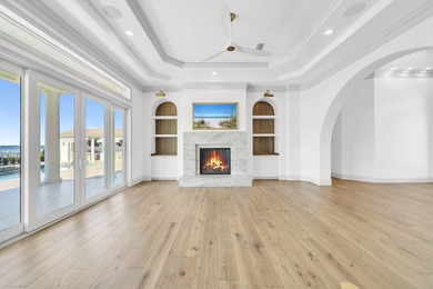 Welcome to 6 Sunset Beach Place, an extraordinary bay front on Golf Club at Bluewater Bay Resort in Florida - for sale on GolfHomes.com, golf home, golf lot