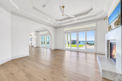 Welcome to 6 Sunset Beach Place, an extraordinary bay front on Golf Club at Bluewater Bay Resort in Florida - for sale on GolfHomes.com, golf home, golf lot