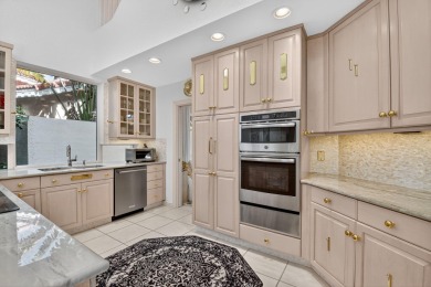 Refined Luxury in this Light Filled Courtyard Estate l Rare on Boca Delray Golf and Country Club in Florida - for sale on GolfHomes.com, golf home, golf lot
