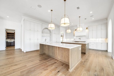 Welcome to 6 Sunset Beach Place, an extraordinary bay front on Golf Club at Bluewater Bay Resort in Florida - for sale on GolfHomes.com, golf home, golf lot