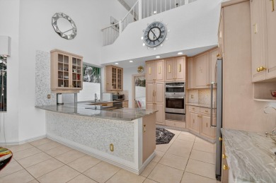 Refined Luxury in this Light Filled Courtyard Estate l Rare on Boca Delray Golf and Country Club in Florida - for sale on GolfHomes.com, golf home, golf lot