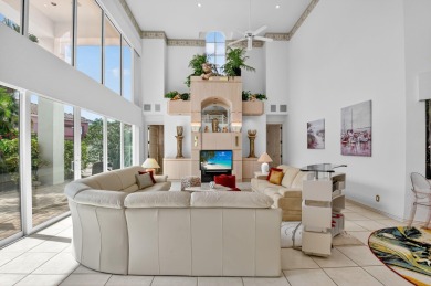 Refined Luxury in this Light Filled Courtyard Estate l Rare on Boca Delray Golf and Country Club in Florida - for sale on GolfHomes.com, golf home, golf lot