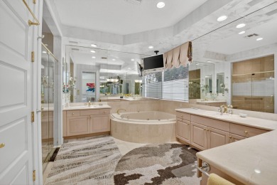Refined Luxury in this Light Filled Courtyard Estate l Rare on Boca Delray Golf and Country Club in Florida - for sale on GolfHomes.com, golf home, golf lot