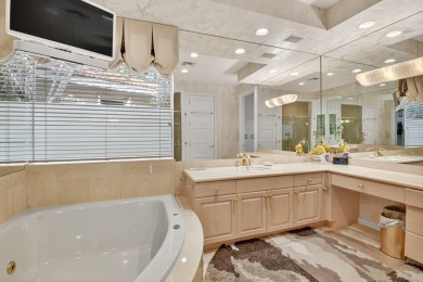 Refined Luxury in this Light Filled Courtyard Estate l Rare on Boca Delray Golf and Country Club in Florida - for sale on GolfHomes.com, golf home, golf lot