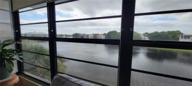 Welcome to this updated spacious condo located on the top floor on Pine Island Ridge Country Club in Florida - for sale on GolfHomes.com, golf home, golf lot