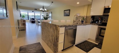 Welcome to this updated spacious condo located on the top floor on Pine Island Ridge Country Club in Florida - for sale on GolfHomes.com, golf home, golf lot