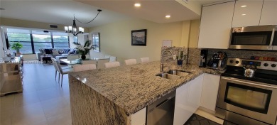 Welcome to this updated spacious condo located on the top floor on Pine Island Ridge Country Club in Florida - for sale on GolfHomes.com, golf home, golf lot