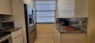 Welcome to this updated spacious condo located on the top floor on Pine Island Ridge Country Club in Florida - for sale on GolfHomes.com, golf home, golf lot