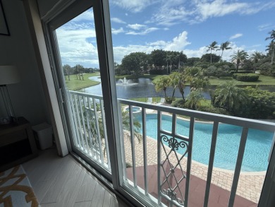 Refined Luxury in this Light Filled Courtyard Estate l Rare on Boca Delray Golf and Country Club in Florida - for sale on GolfHomes.com, golf home, golf lot