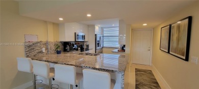 Welcome to this updated spacious condo located on the top floor on Pine Island Ridge Country Club in Florida - for sale on GolfHomes.com, golf home, golf lot