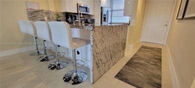 Welcome to this updated spacious condo located on the top floor on Pine Island Ridge Country Club in Florida - for sale on GolfHomes.com, golf home, golf lot