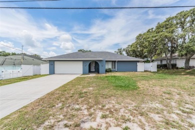 Welcome to 5540 Applegate Dr, Spring Hill, FL 34606--a on Oak Hills Country Club in Florida - for sale on GolfHomes.com, golf home, golf lot