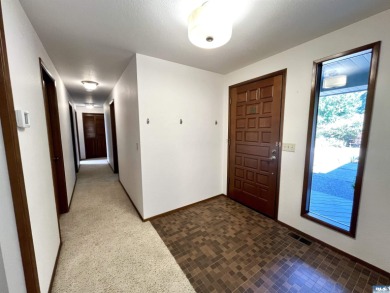 Welcome to this bright and beautifully laid out 3 bed, 2 bath on SunLand Golf and Country Club in Washington - for sale on GolfHomes.com, golf home, golf lot
