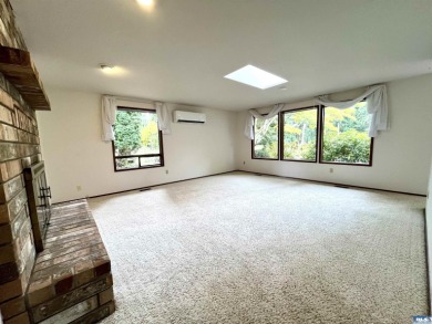 Welcome to this bright and beautifully laid out 3 bed, 2 bath on SunLand Golf and Country Club in Washington - for sale on GolfHomes.com, golf home, golf lot