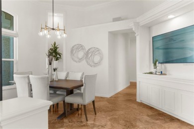 This home is a true SHOWSTOPPER, blending timeless elegance with on Westchase Golf Club in Florida - for sale on GolfHomes.com, golf home, golf lot