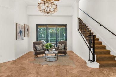 This home is a true SHOWSTOPPER, blending timeless elegance with on Westchase Golf Club in Florida - for sale on GolfHomes.com, golf home, golf lot