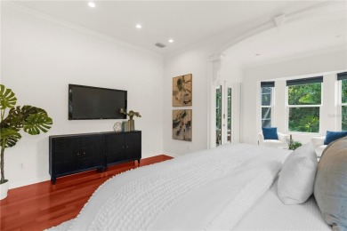 This home is a true SHOWSTOPPER, blending timeless elegance with on Westchase Golf Club in Florida - for sale on GolfHomes.com, golf home, golf lot