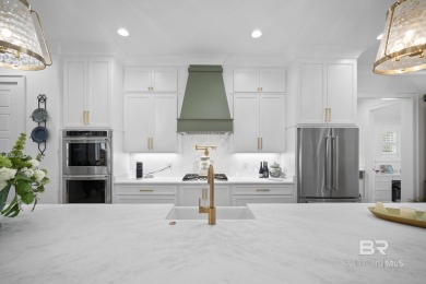 This gold fortified white painted concrete board home in the on Lakewood Golf Club in Alabama - for sale on GolfHomes.com, golf home, golf lot