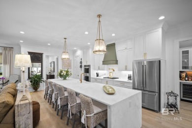 This gold fortified white painted concrete board home in the on Lakewood Golf Club in Alabama - for sale on GolfHomes.com, golf home, golf lot