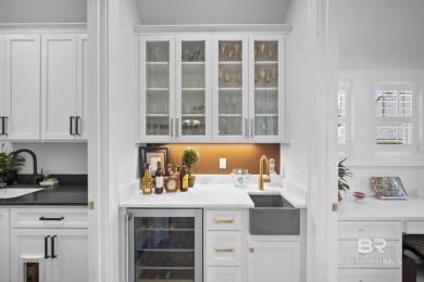 This gold fortified white painted concrete board home in the on Lakewood Golf Club in Alabama - for sale on GolfHomes.com, golf home, golf lot